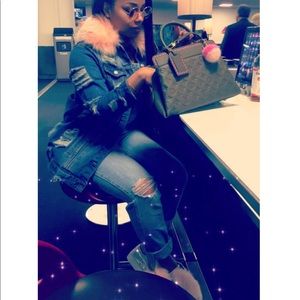 Jean jacket with pink faux fur collar